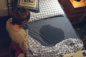 Enurezisul: ce cauzează udarea patului în timpul nopții?