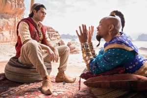 Mena Massoud as the street rat with a heart of gold, Aladdin, and Will Smith as the larger-than-life Genie in Disney’s ALADDIN, directed by Guy Ritchie.