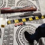 Percheziții, în Timiș, la persoane bănuite că dețin ilegal arme neletale